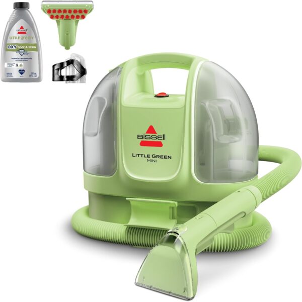 A green Bissell Little Green Mini carpet and upholstery cleaner with a hose and cleaning head, shown with cleaning solution, a small brush attachment, and another nozzle accessory.